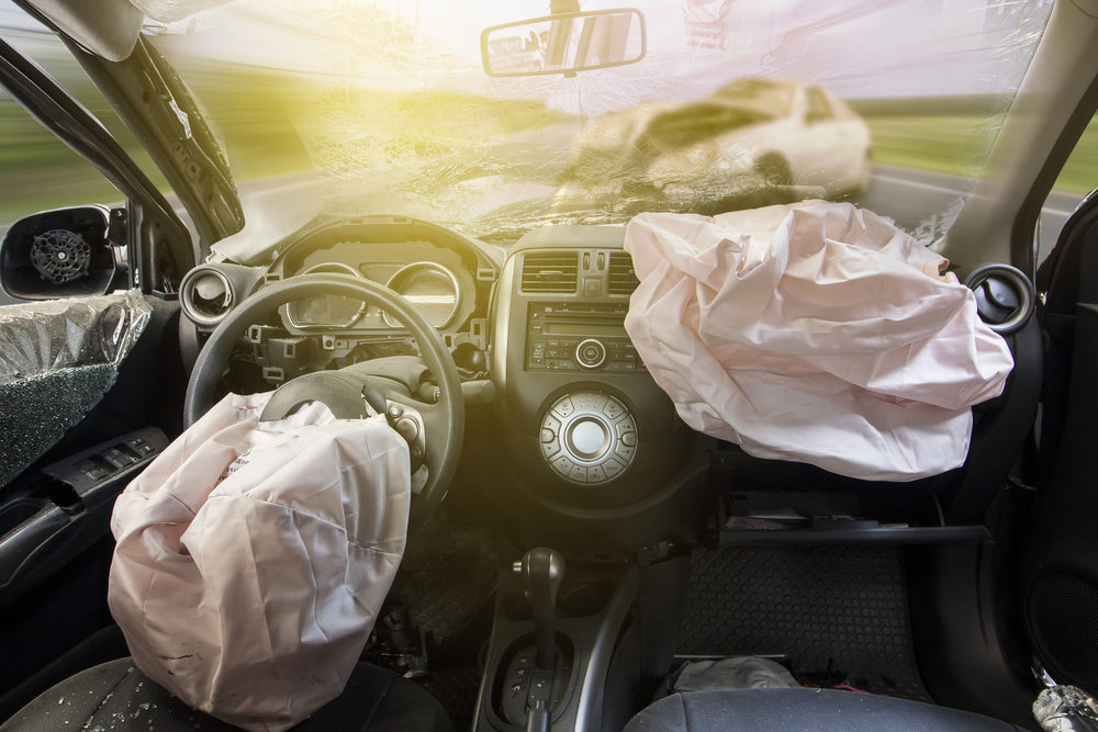 BMW Recalls 394,029 Vehicles Due to Unsafe Airbags airbags deployed in interior of car after an accident