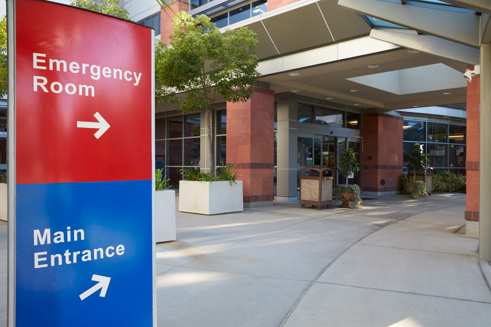 Florida HCA Hospitals Understaffed and Putting Patients at Risk Main Entrance Of Modern Hospital Building With Signs