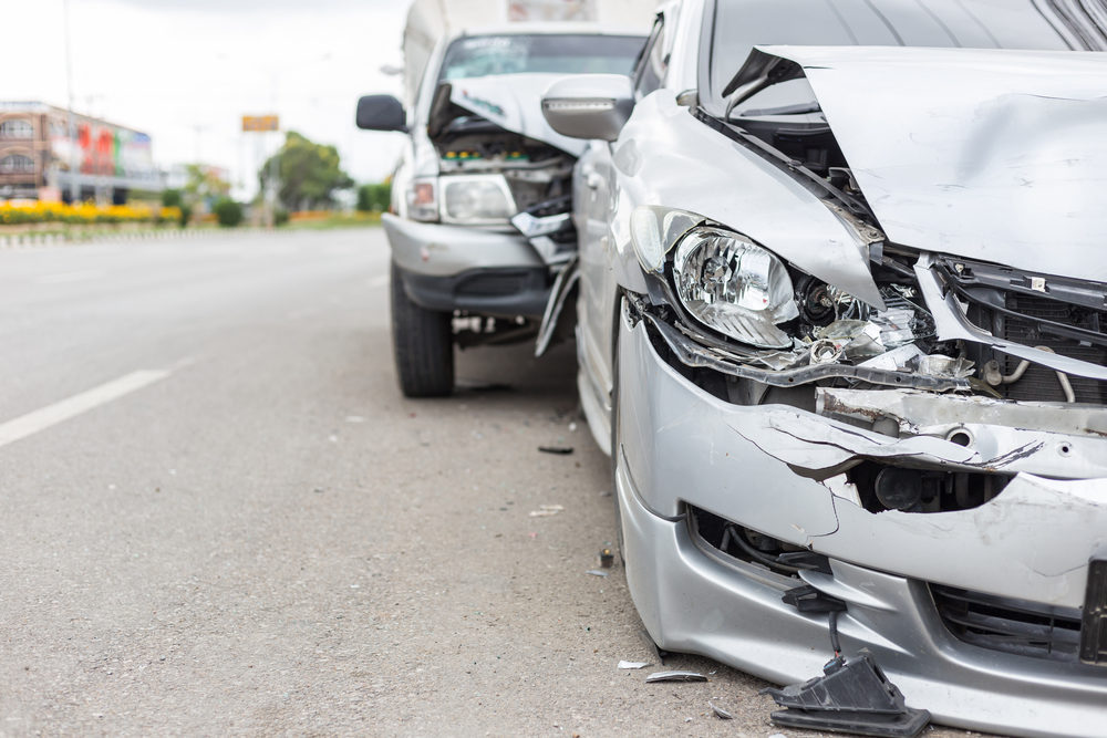Do Slow Drivers Cause Virginia Traffic Accidents? frontal view of two vehicles after an accident