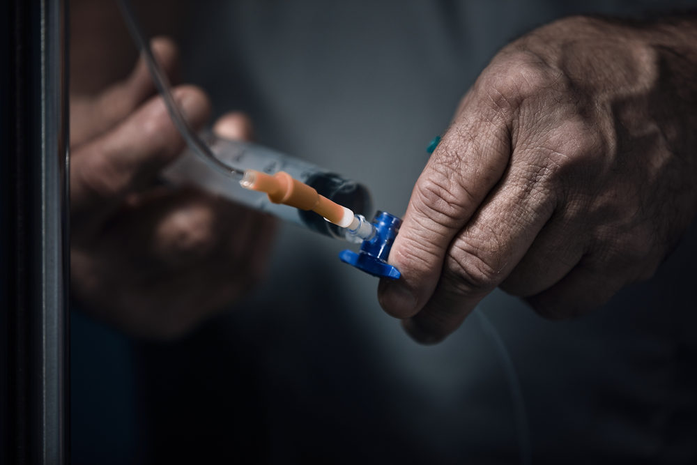 Sparrow Nurse Alleges Culture of Giving Drugs Without Doctors’ Order Hands of the doctor make an injection in a dropper.