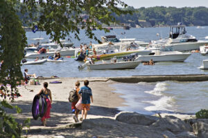  Rocky River, Cleveland, Ohio group of boaters near the shore