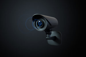 Security camera attached to wall