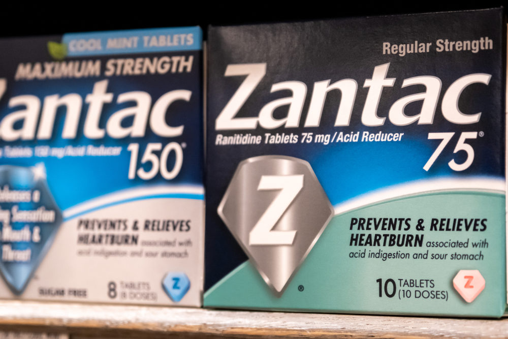 Zantac Manufacturers Under Investigation for Possible Violations of the False Claims Act Boxes of Zantac on a market shelf