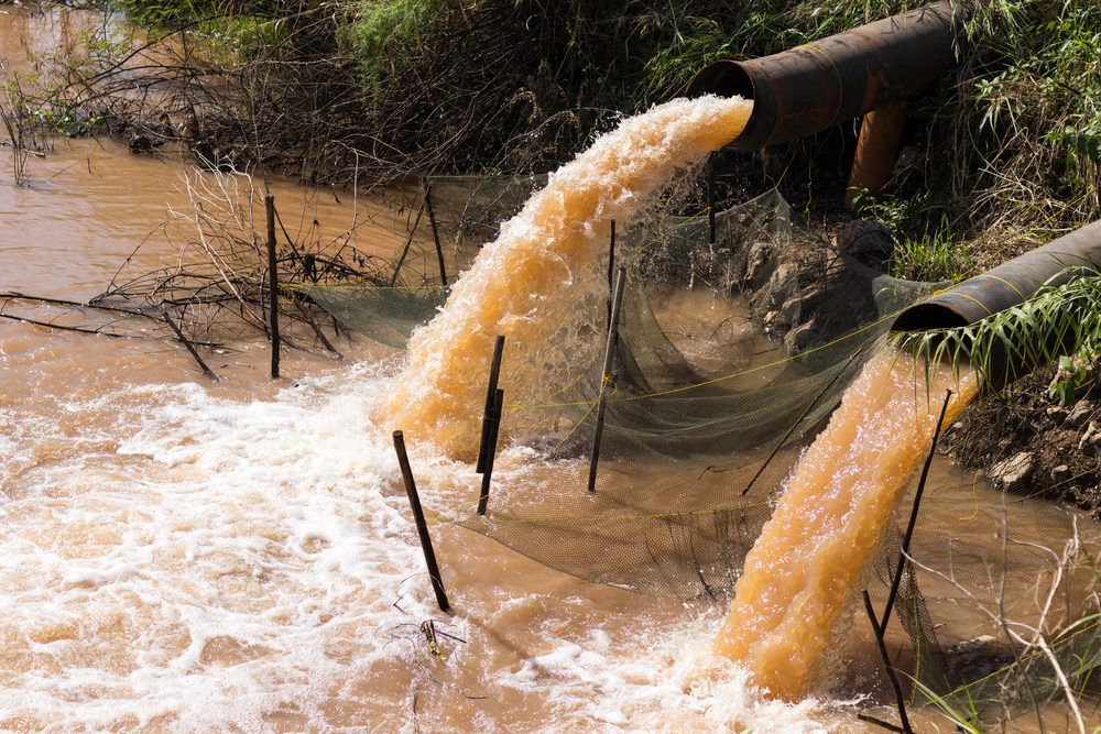 Camp Lejeune Justice Act Finally Passes Congress, Heads to President’s Desk water gushing from sewer pipes