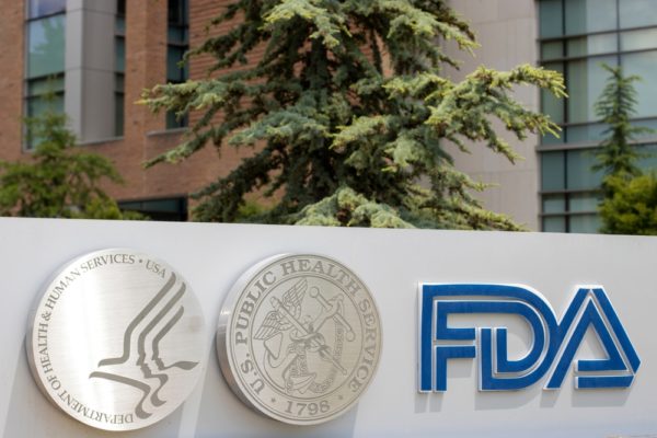 The U.S. Department of Health and Human Services (HHS), U.S. Public Health Service (USPHS) and FDA logos are seen at the FDA headquarters