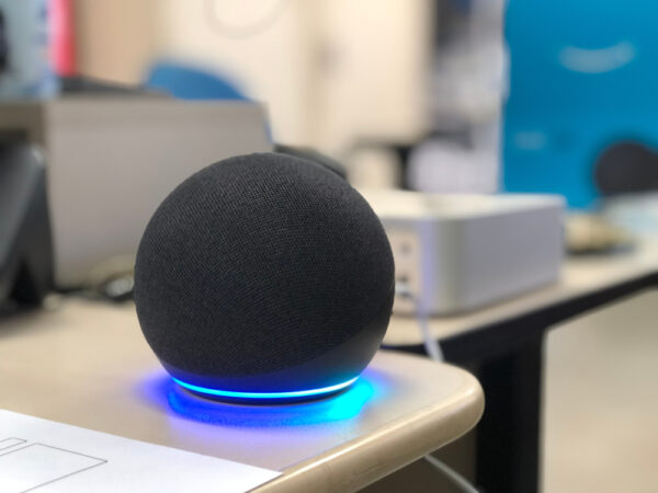 Closeup of Alexa Dot 4 virtual assistant on a desk